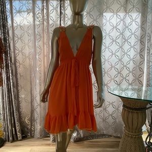 Orange free flowing dress with beaded straps